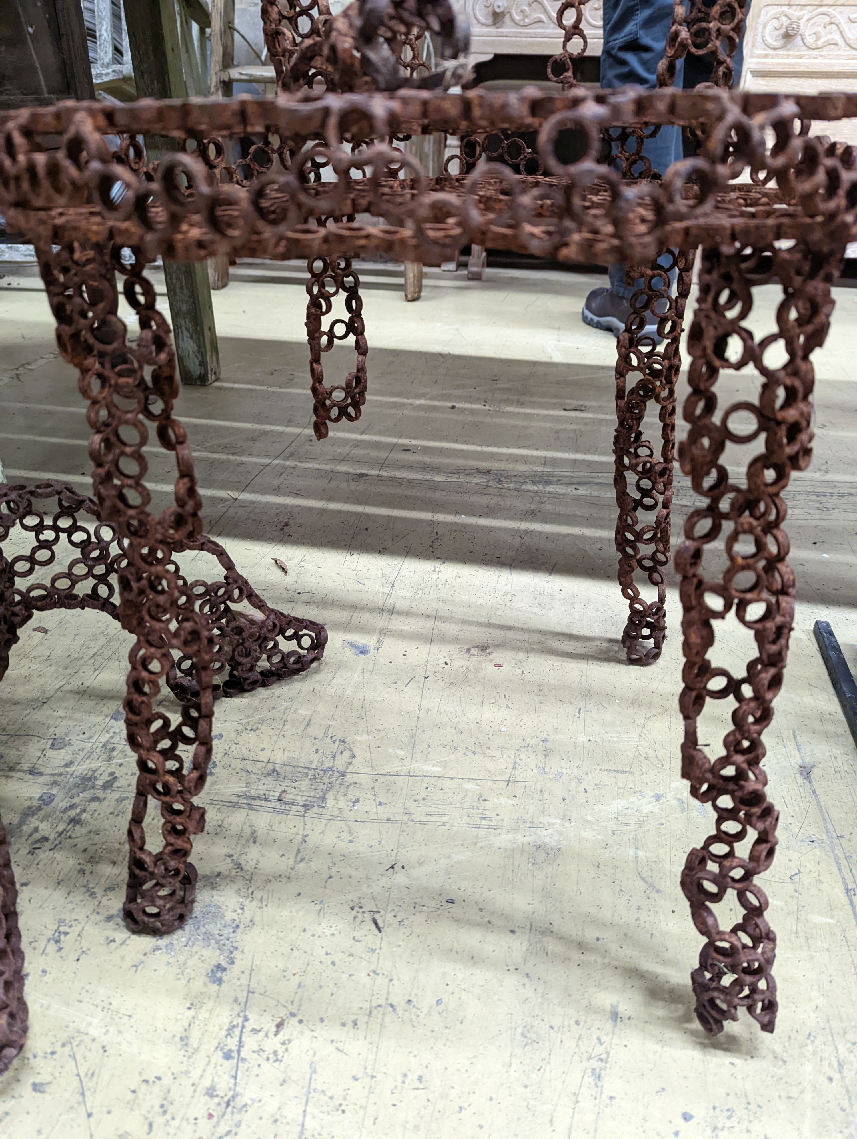 A reclaimed metal table and chair (chair a.f.) table measurements, D-54cm, H-66cm.